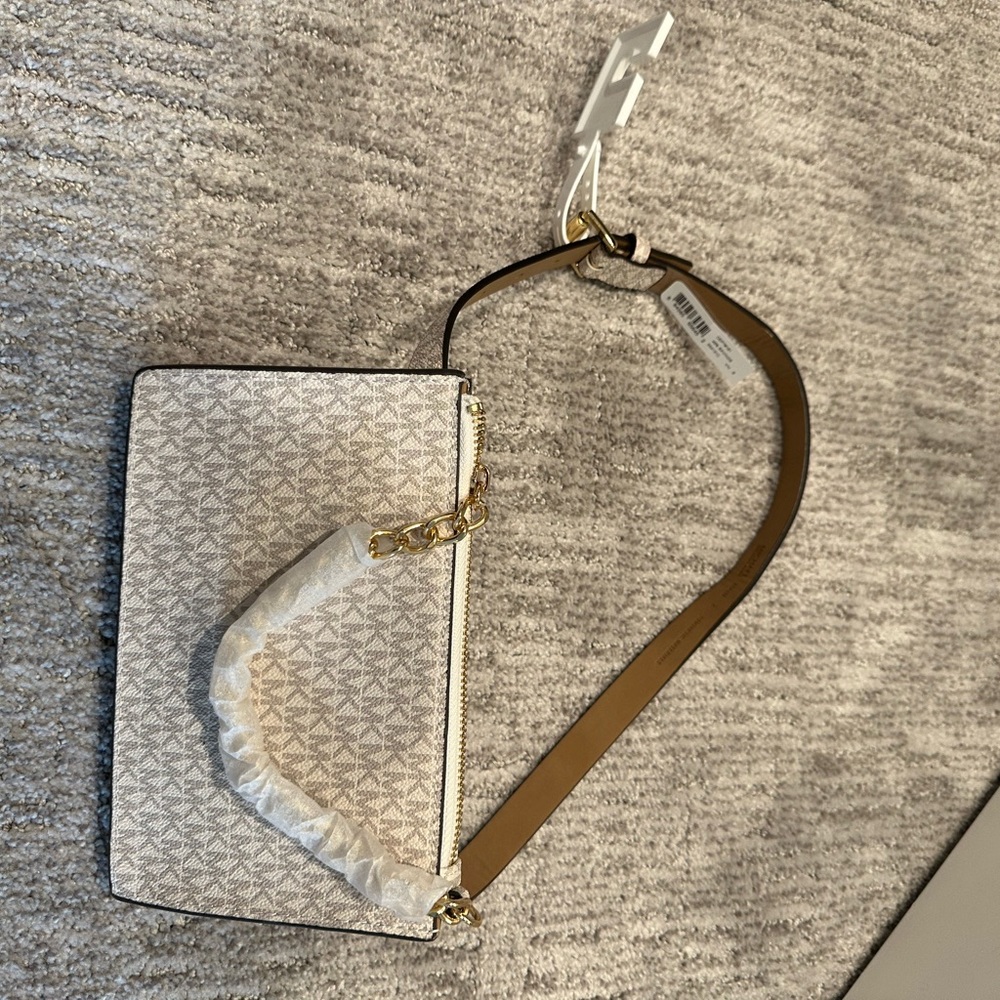 Brand new Michael kors waist bag size small